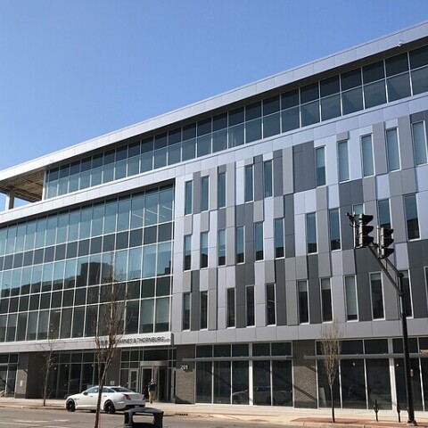 Varying shades of gray mcm panel installed by TFC on a commercial building.