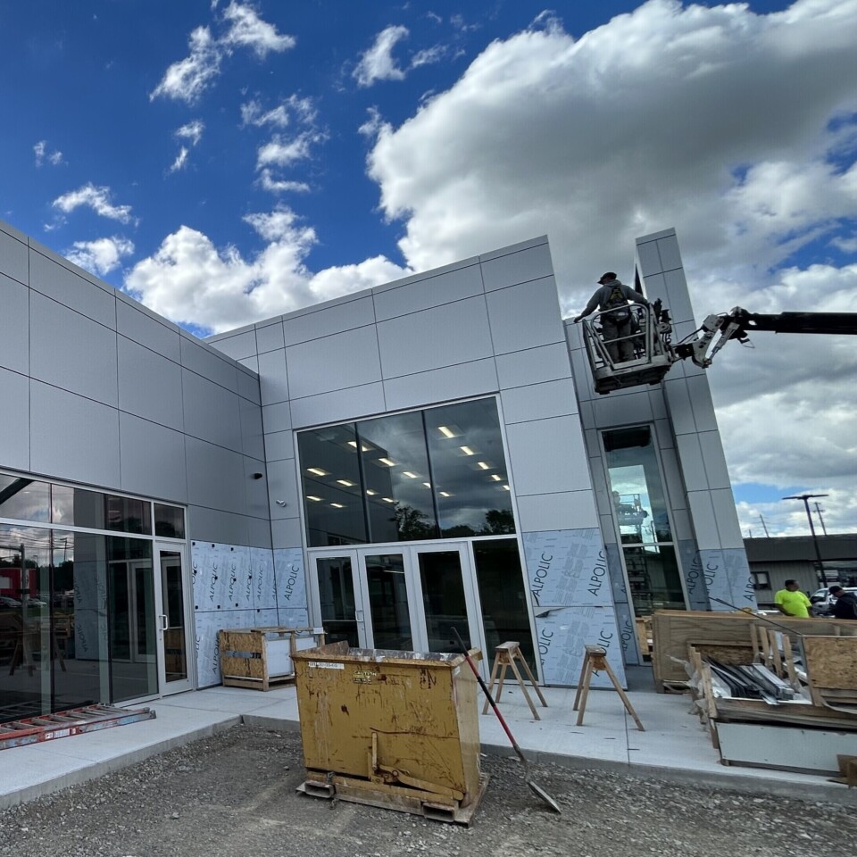 TFC installers installing ALPOLIC materials.